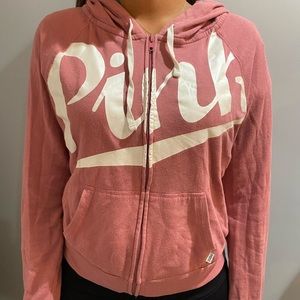 selling this adorable PINK sweater. size M